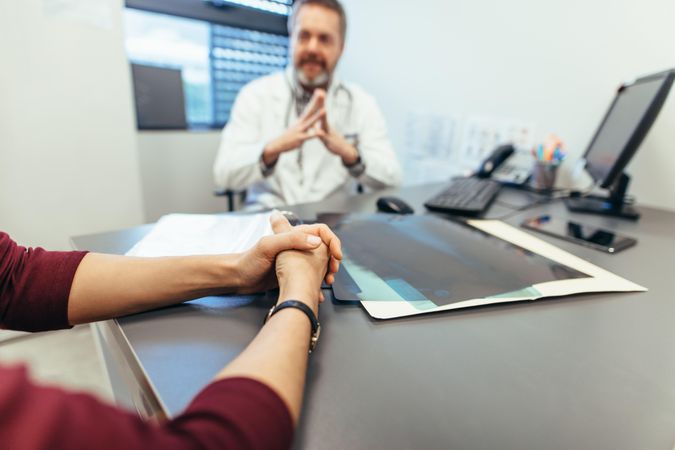 Woman meeting with medical doctor to seek advice