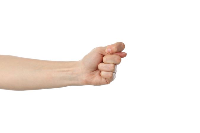 Female hand showing gesture, isolated on plain background