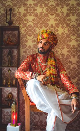 Man wearing turban looking away indoor