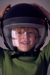 Smiling boy in safety helmet