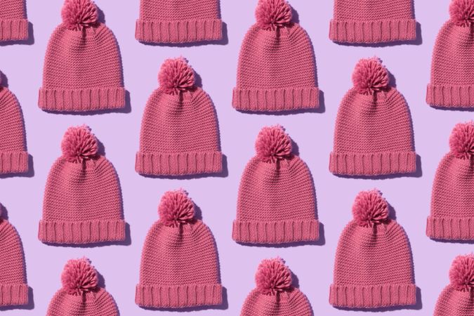 Beanies on pink background