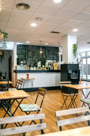 Empty cafe interior with chairs and tables