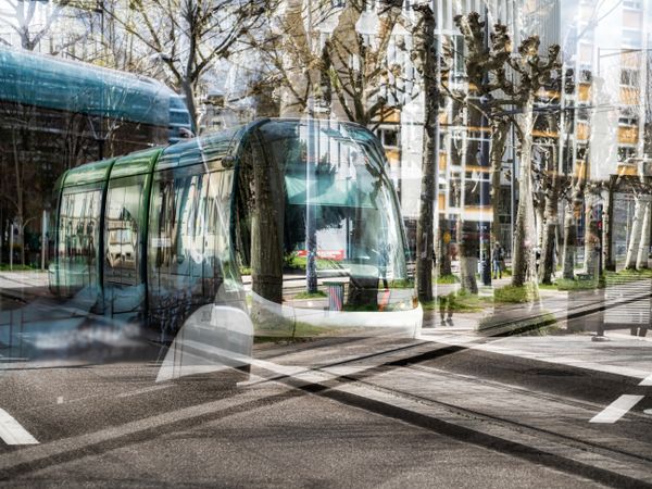 Unusual view of the city. Disappearing trams on the streets of the city of Strasbourg.