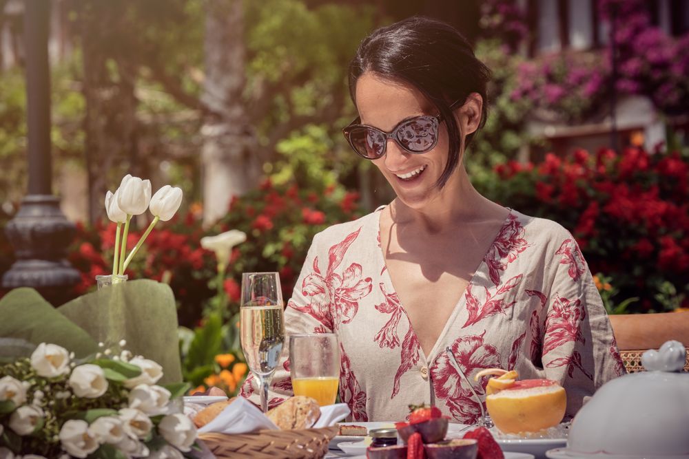 Woman Relaxing and Having Brunch