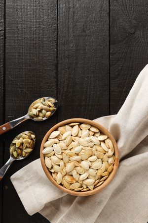 Cooking ingredients for fall season - pumpkin seeds, pumpkin