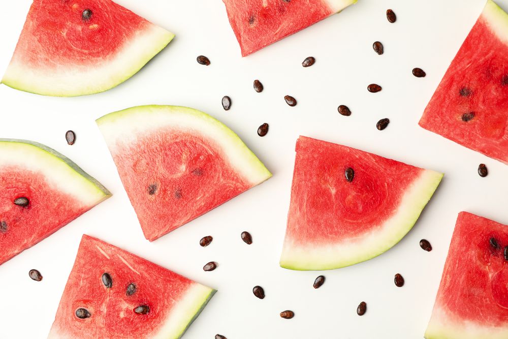 Composition with fresh watermelon slices on blank background, top view
