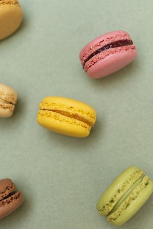 Top view of colorful macaroon on a marble background