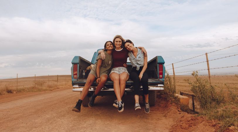 Group of women on a country side road trip