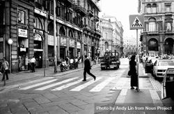 Milan, Italy - June 1999 - Monochrome image of man crossing street in Milan 0PA8O5