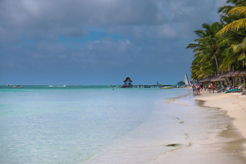 Idyllic water on busy Mauritius beach