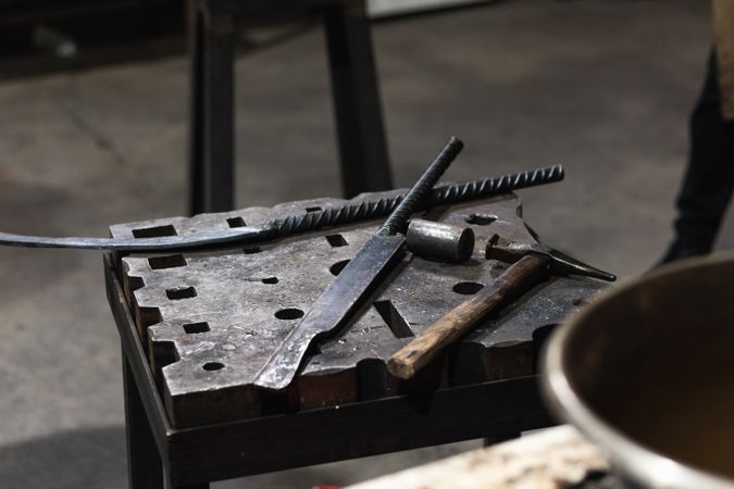 Different metal sharp tools at workbench