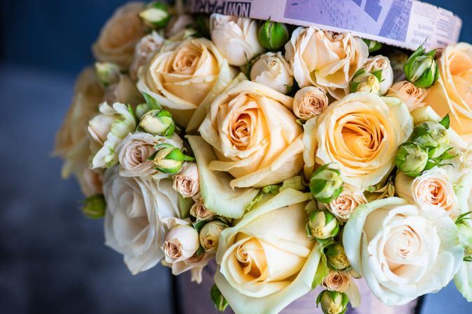 Pastel floral arrangement on concrete background