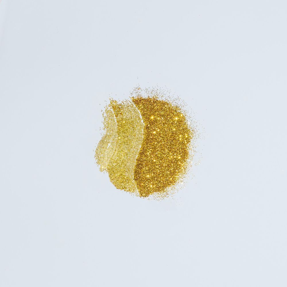 Coffee bean made of gold glitter paint