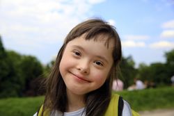 Close up of beautiful child smiling at camera