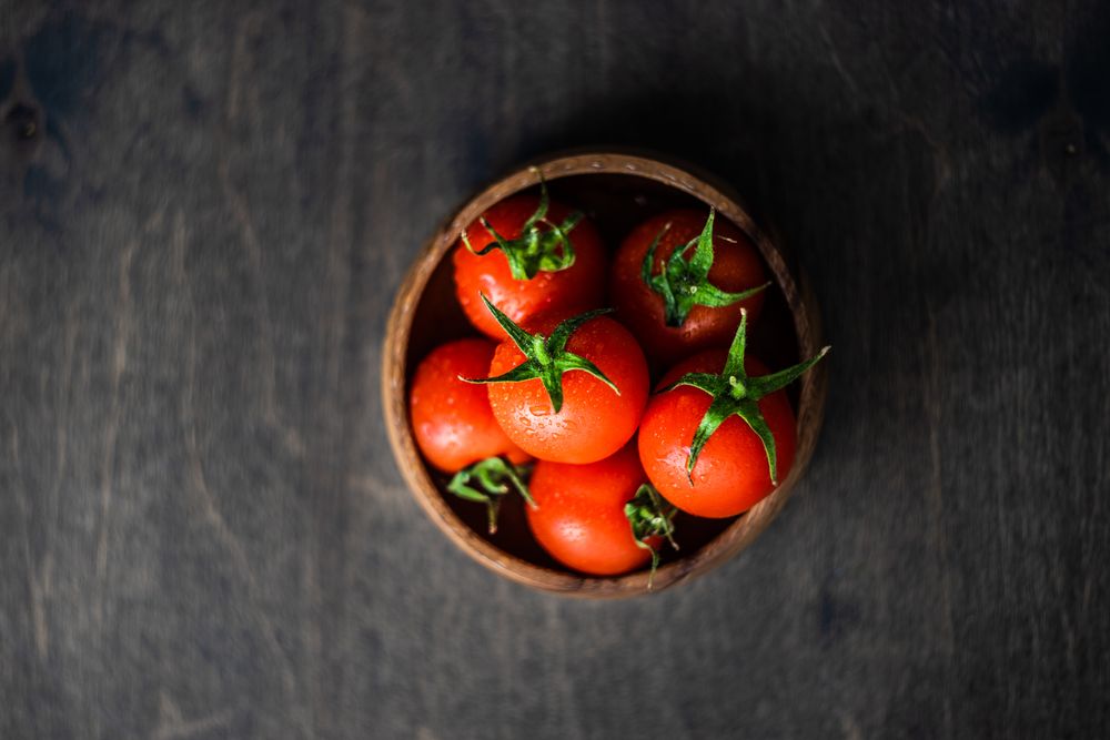 Top view of bowl of fresh tomatoes