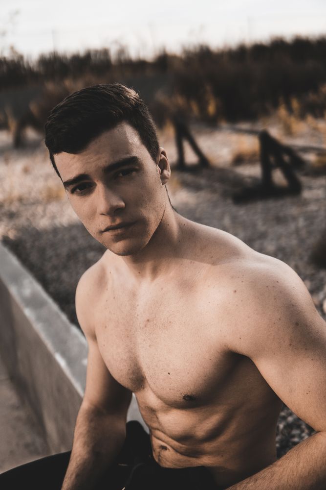 Strong male near concrete wall