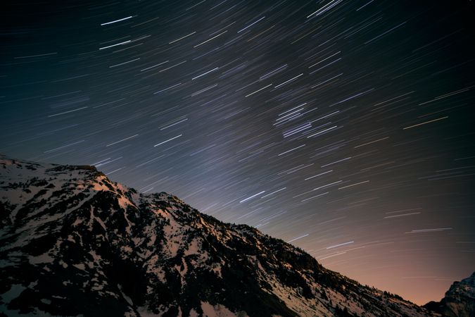 Mountain peak against starry sky