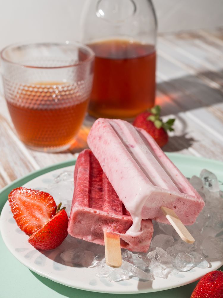 Refreshing strawberry popsicle on plate