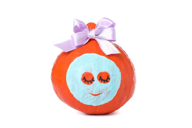 Pumpkin with facial mask and bow