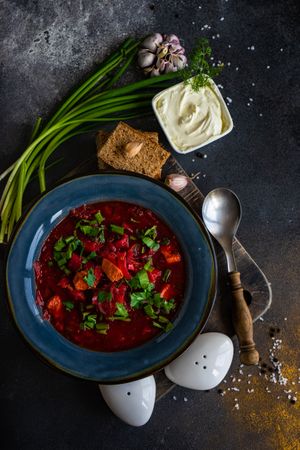 Top view of Ukrainian beetroot soup borscht on counter