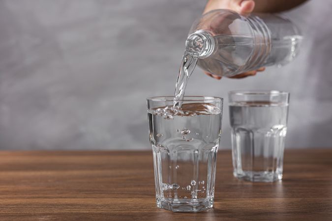 Glass of fresh water on the table.