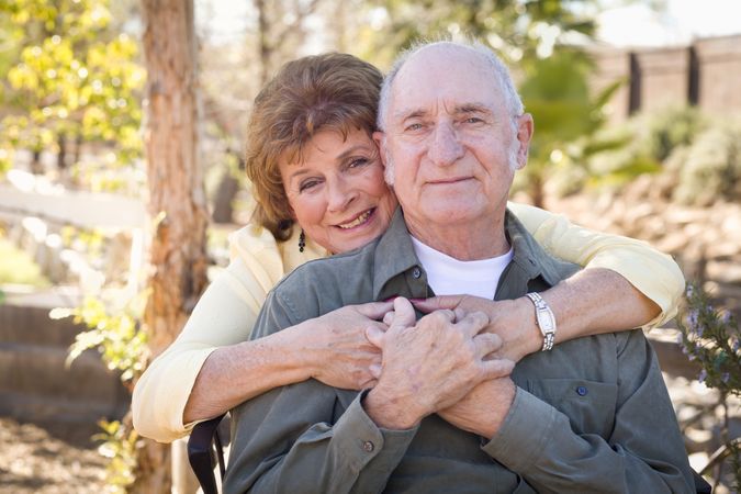 Happy Mature Couple Relaxing in The Park