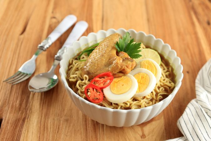 Indomie Rebus or Instant Boiled Noodle with Soto Flavour