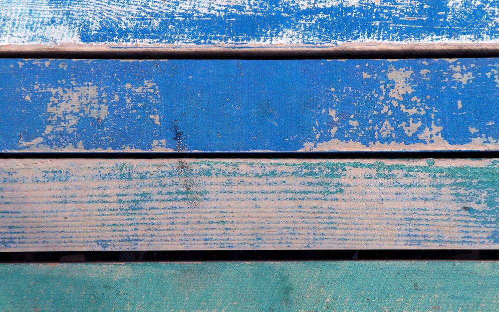 Old wooden texture with grunge paint. Wood texture in vintage style.