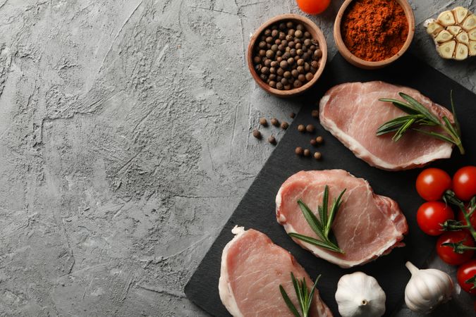 Composition with raw meat and ingredients. Cooking steak concept