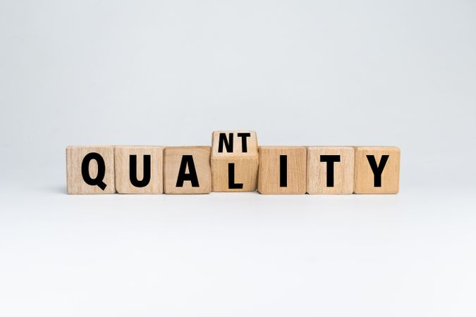 flip wooden blocks with quality and quantity words
