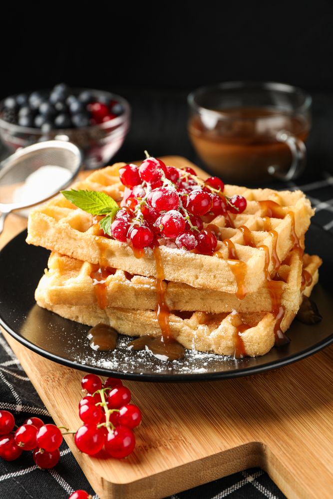 Beautiful composition with sweet waffles, space for text