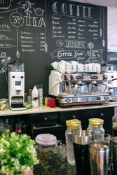 Empty cafe interior with coffee maker