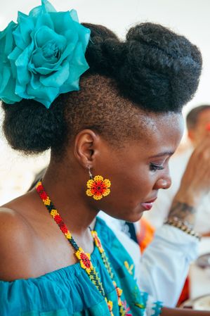 Side view of Zulu bride wearing beaded jewelry from Mexico