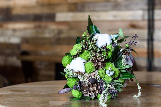 Green flower bouquet on table