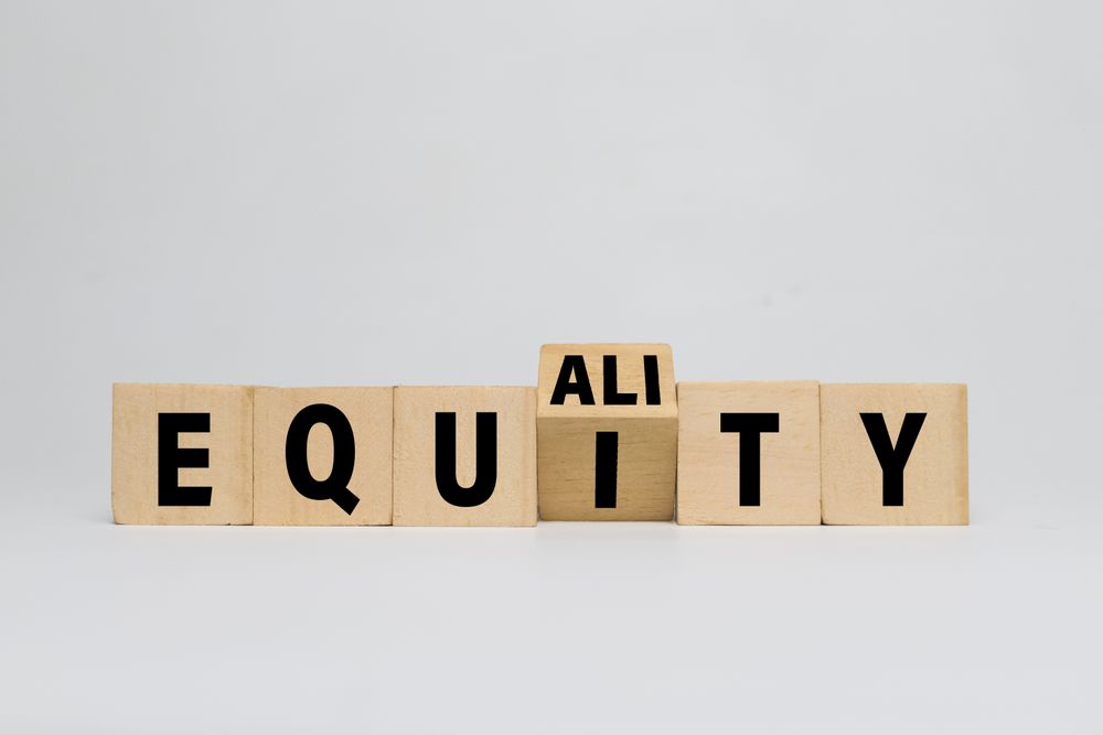 flip wooden blocks with equality and equity words isolated on plain background