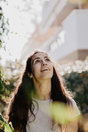 Cheerful woman in garden