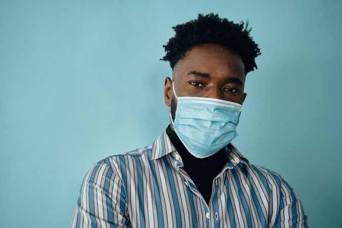 Portrait of a Black man wearing face mask