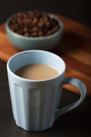Cup of coffee with creamy milk.