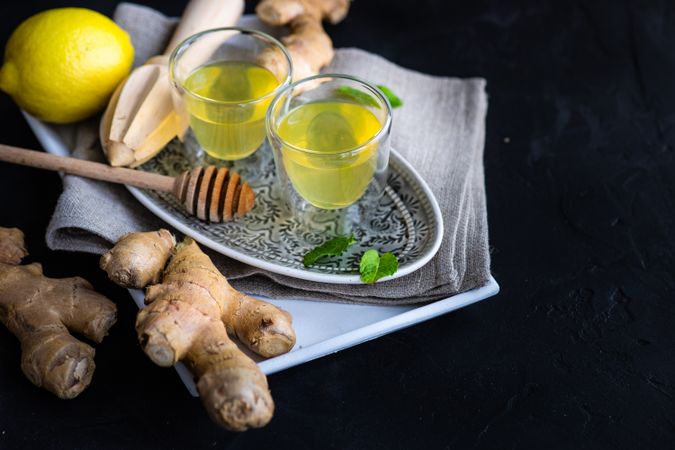 Detox shots with lemon, ginger and mint with copy space