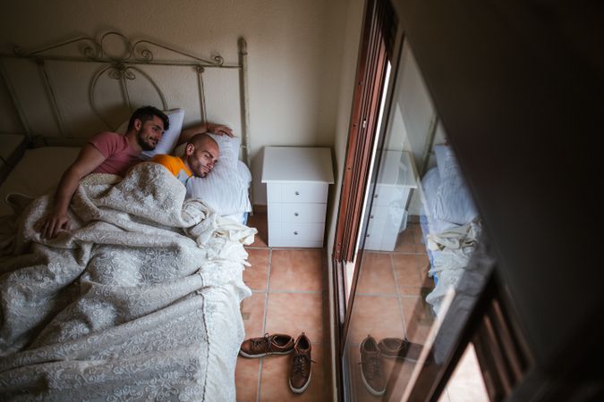 Gay couple in bed