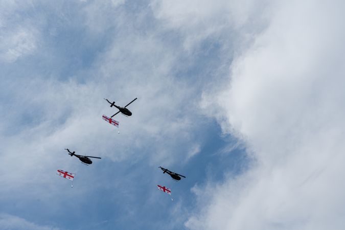 Helicopters fly in the sky of Tbilisi city