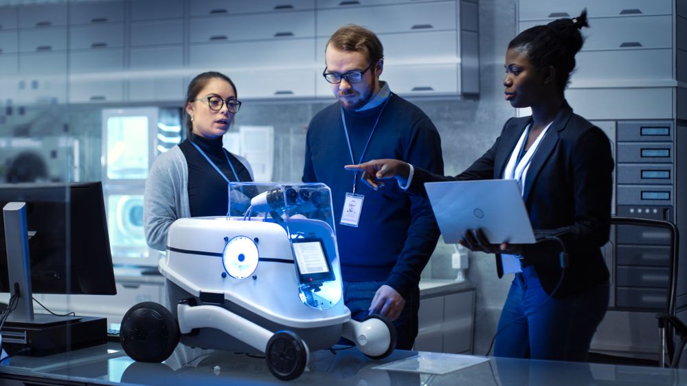 Multi Ethnic Team of Male and Female Leading Scientists Work on Innovative Robotics Technology.