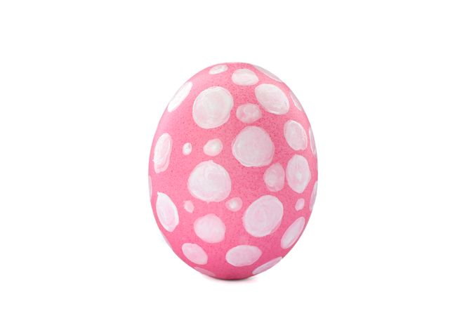 Decorative Easter egg isolated on light background. Festive tradition