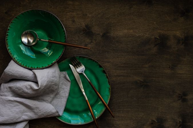 Rustic table setting with bright green ceramic plates
