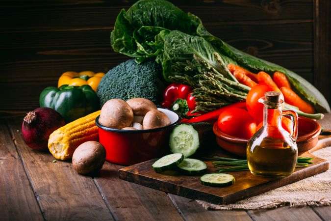 Vegetables and utensils on kitchen table