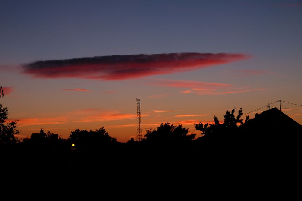 Red sunrise with ominous cloud