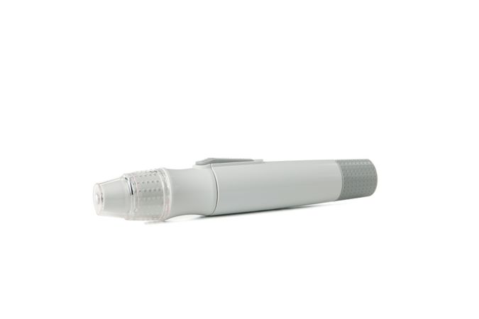 Blood glucose meter isolated on light background