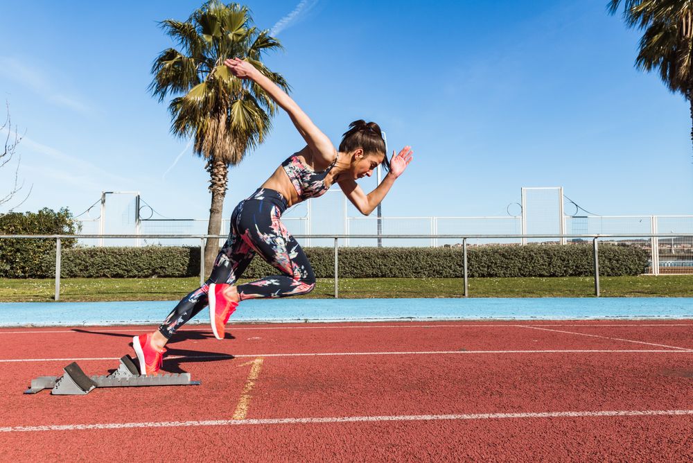 woman running on track