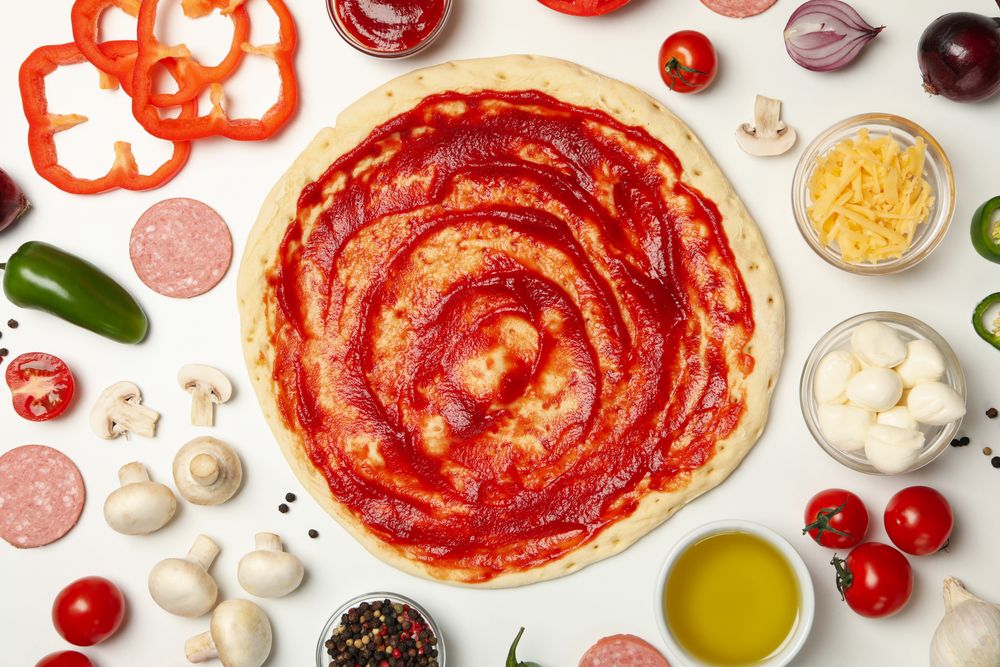 Ingredients for cooking pizza on plain background, top view