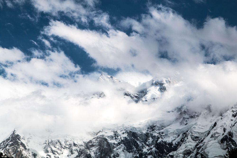 Cloudy blue sky over Fairy Meadows Nanga Parbat mountain